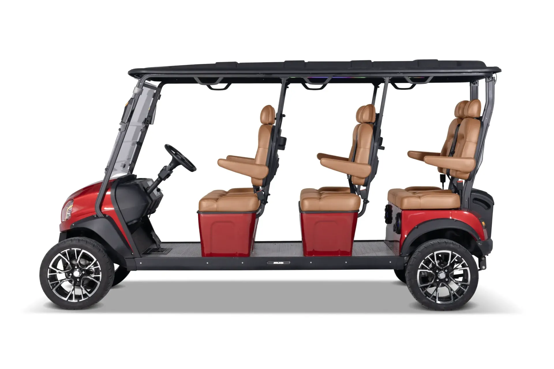 Red four-seat golf cart side view with tan seats and black roof on a white background