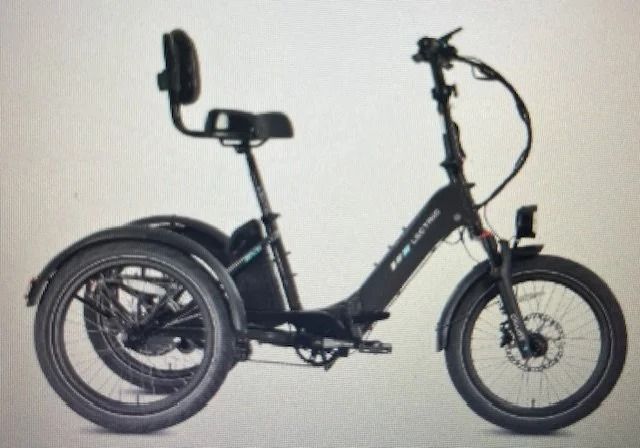 Black electric trike with a seat, backrest, and front headlight.