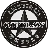 A circular black and white logo with a star in the center, reading 