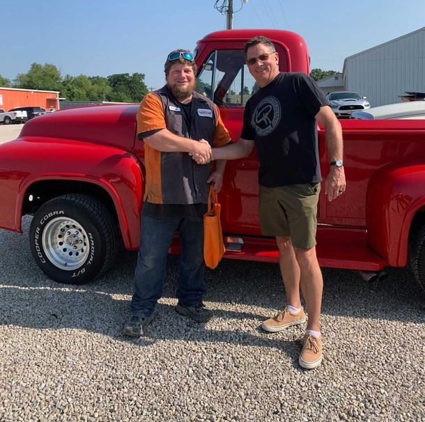 Ultimate All In One Owner, Bryan Robertson with a restoration customer.
