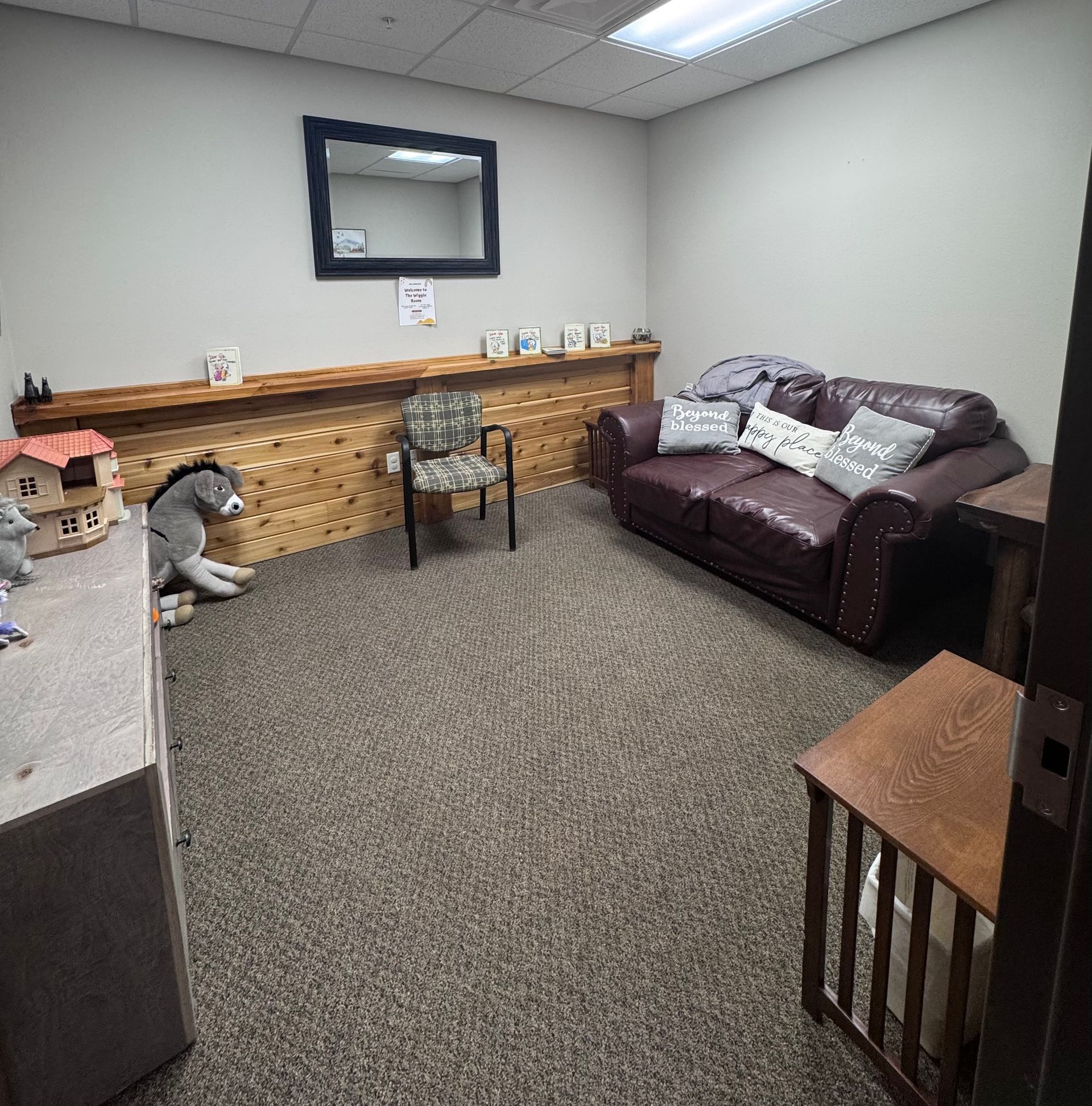 Family room filled with furniture.