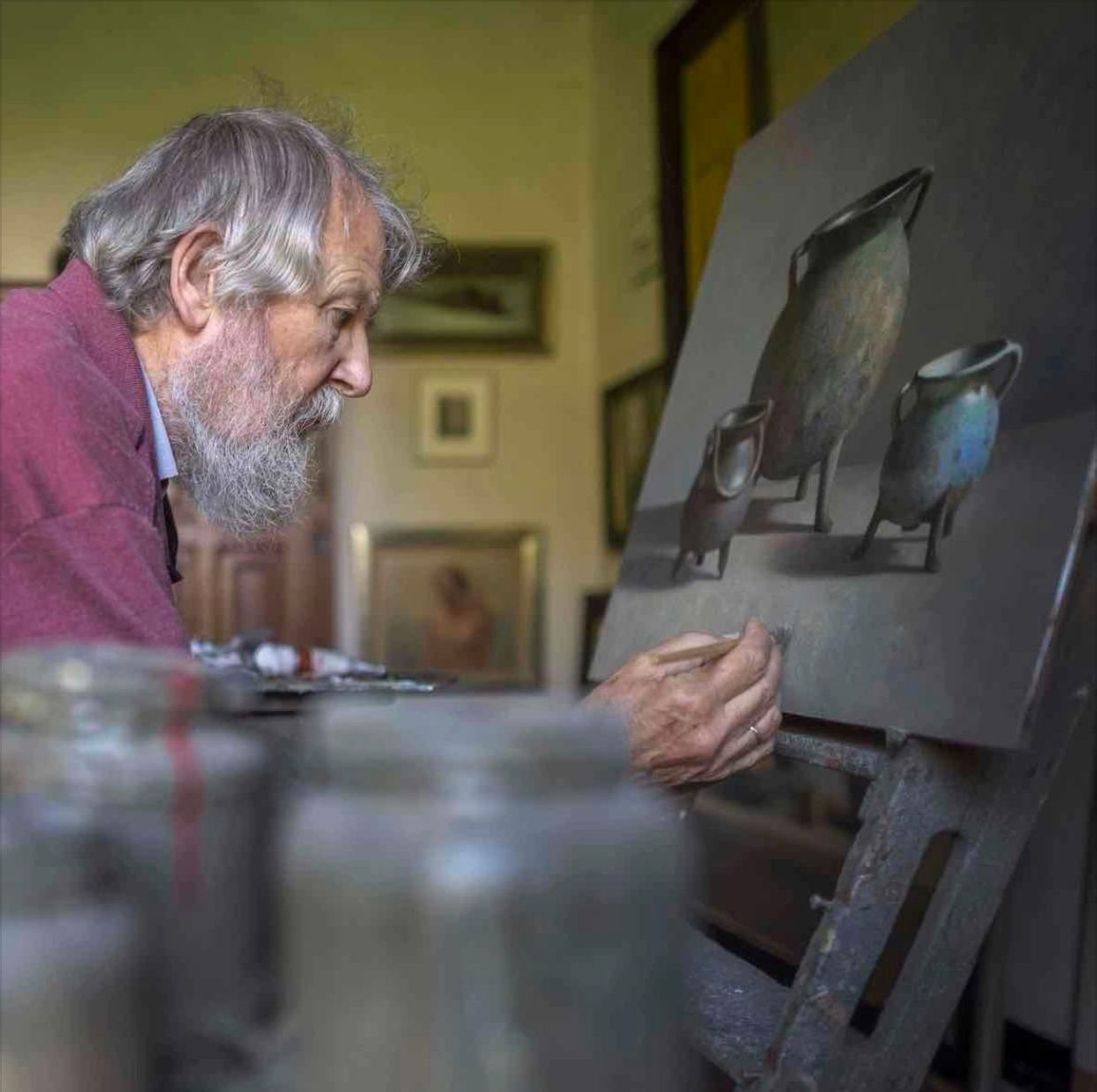Helmantel Schilderij aan het werk
