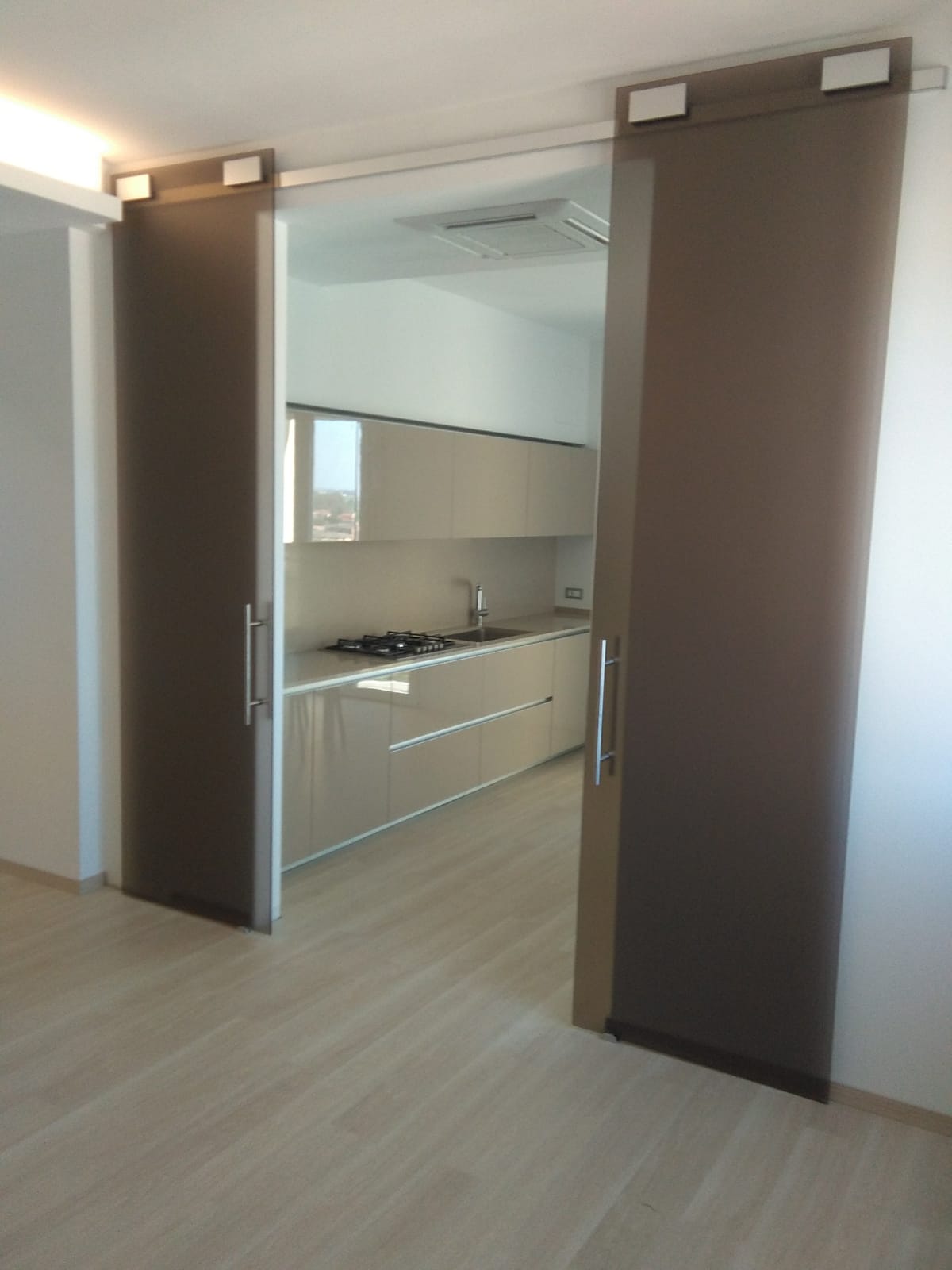 porte in vetro per centri commerciali