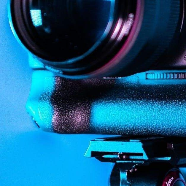 A close up of a camera with a blue background