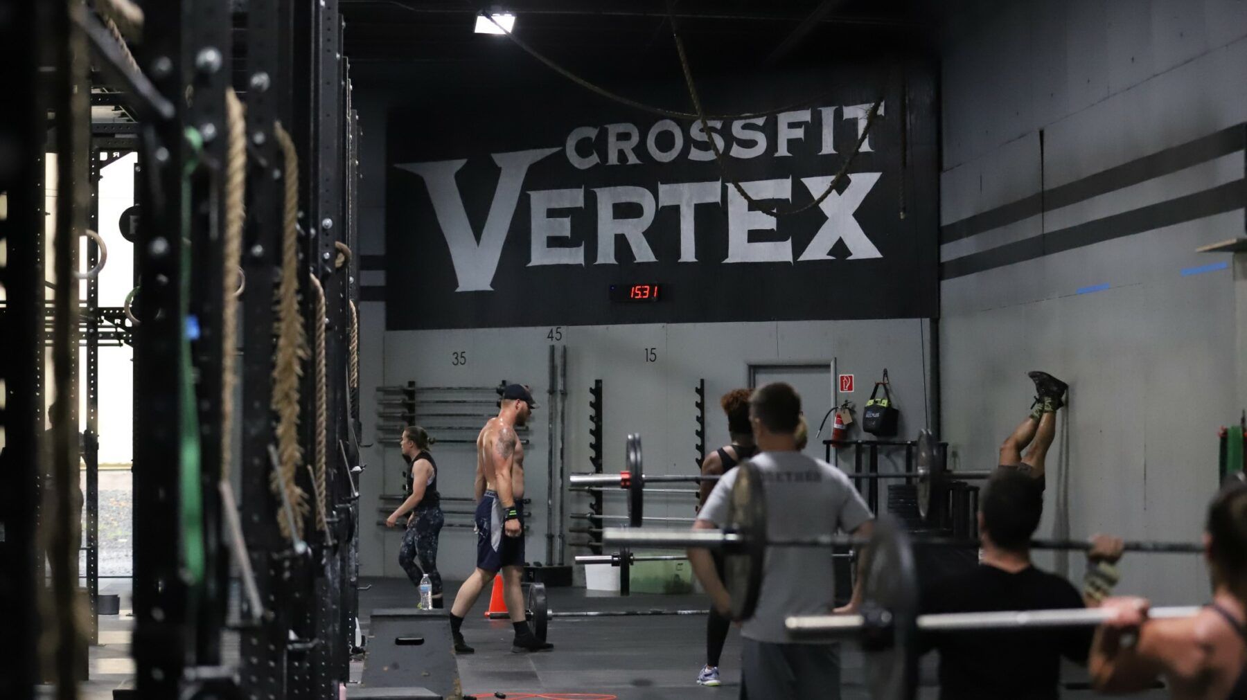 A group of people are working out at crossfit vertex gym near Scranton, PA