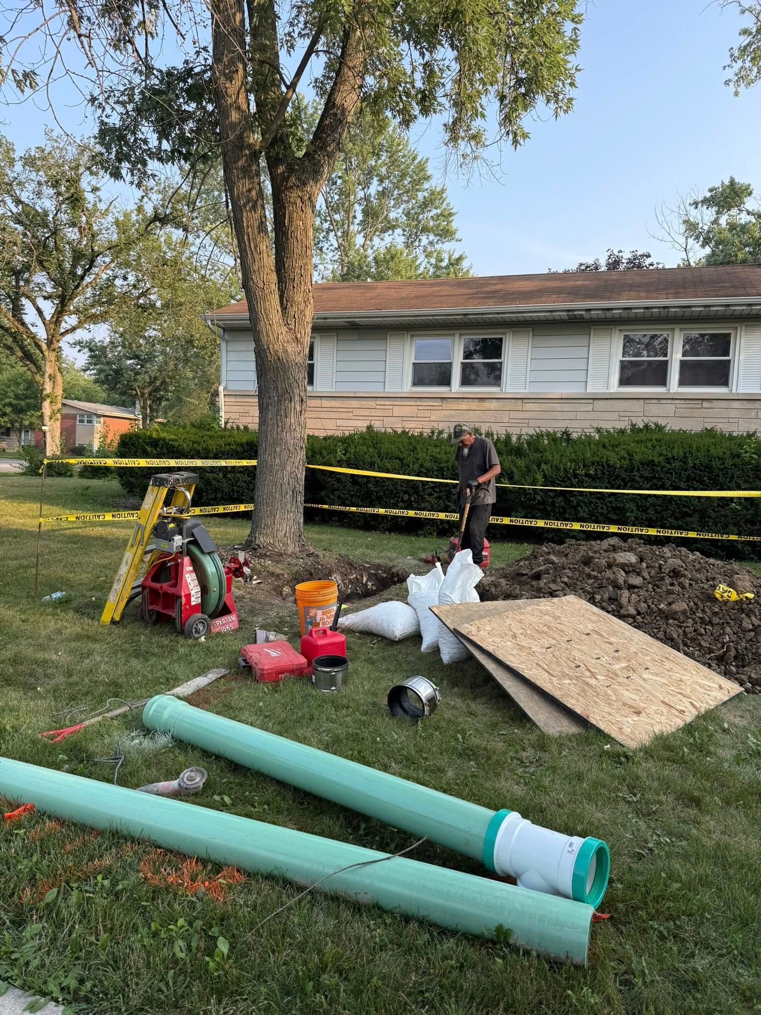Person in red suit holding a device displaying a close-up image of a brown stone structure.