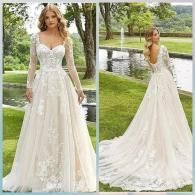 A dual view of a white, long-sleeved lace wedding dress with a full skirt, shown from the front and back in a garden.