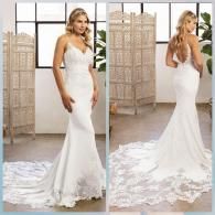 Front and back view of a white, floor-length wedding dress with a sweetheart neckline and a long, lace-trimmed train.