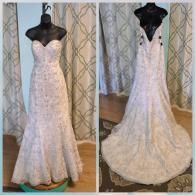 A strapless, ivory, floor-length lace wedding dress with a train, shown on a mannequin from the front and back.