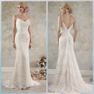 Front and back views of a floor-length white lace wedding dress with spaghetti straps