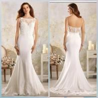 A white, form-fitting mermaid-style wedding dress with lace bodice detailing, shown from the front and back.