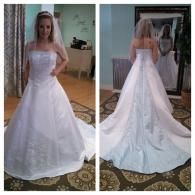 A split view of a person wearing a white, strapless A-line wedding dress with a long train and a veil.