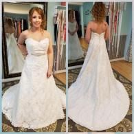 A split view of a person wearing a white, strapless, A-line wedding dress with lace embroidery, shown front and back.
