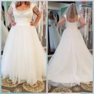 A person wears a white wedding dress with a scoop neck, cap sleeves, and a full tulle skirt, viewed from front and back.