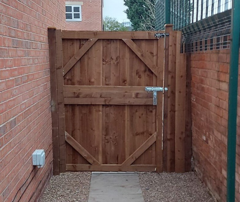 wide side wooden gate to access the garden for property in Cardiff
