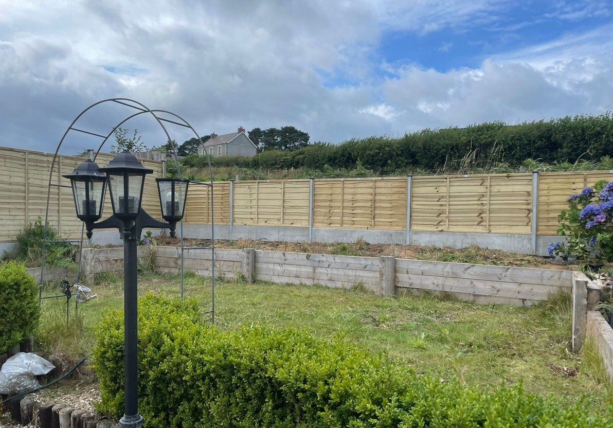 J&Z Fencing lap fence panel installation in Caerphilly using Dura Posts and gravel boards