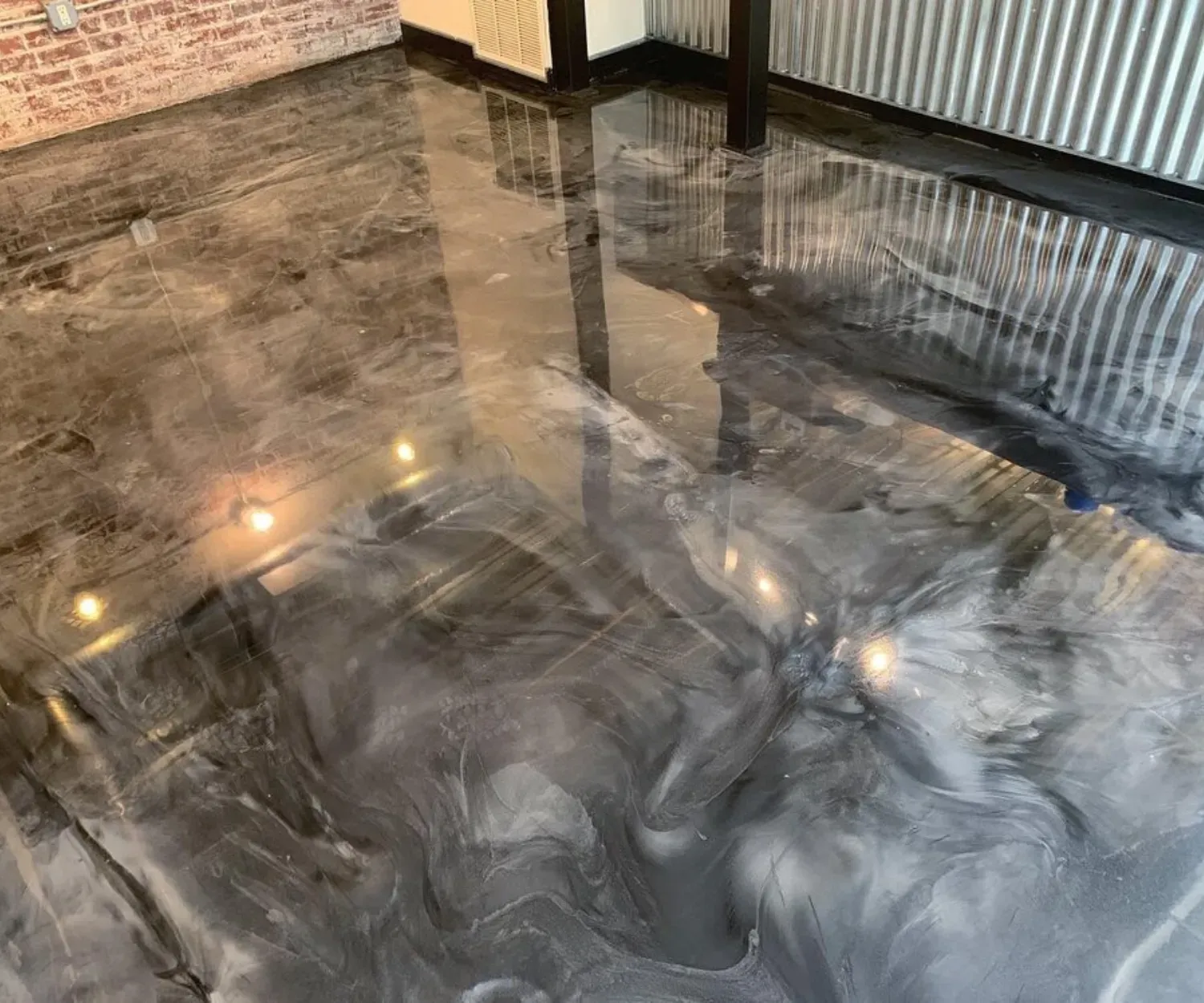 Roofers repair damaged house roof on a sunny day.