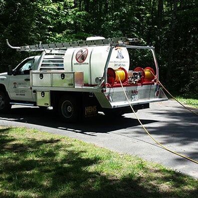 Parked Service Car — Alfred, ME — Liberty Pest Control