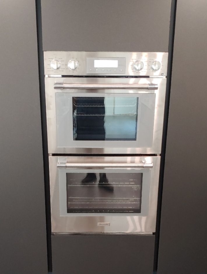 A stainless steel double oven in a kitchen