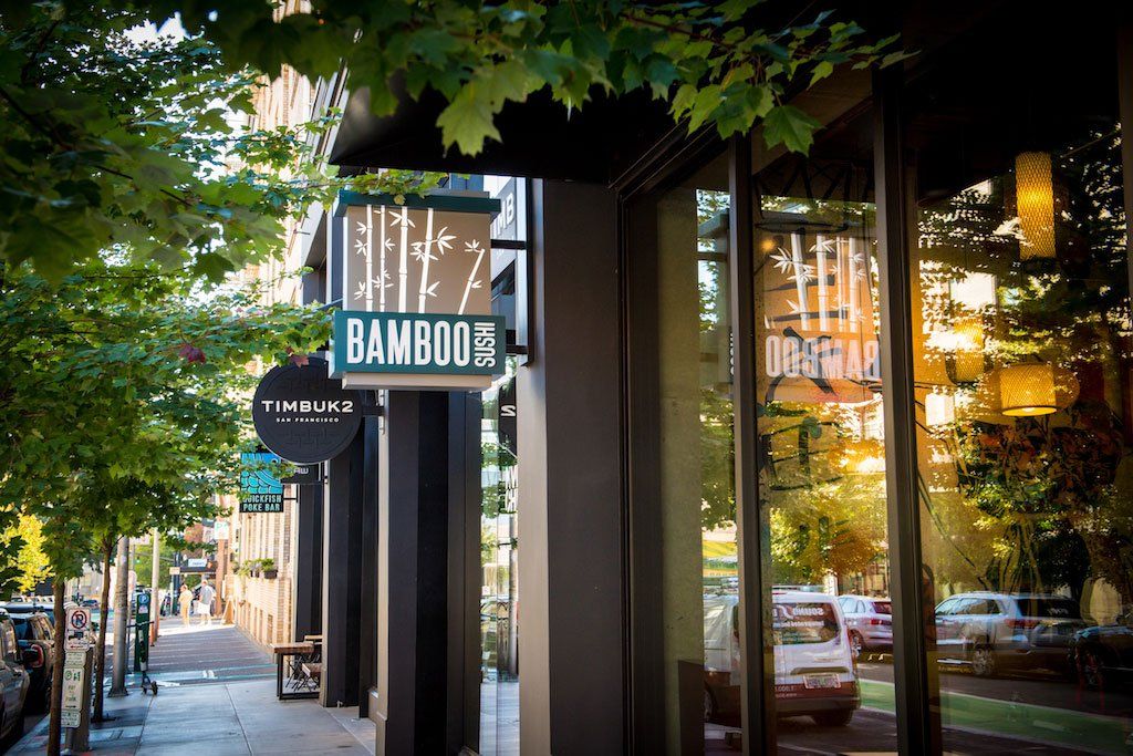 Spencer Court Exterior with Business Signs