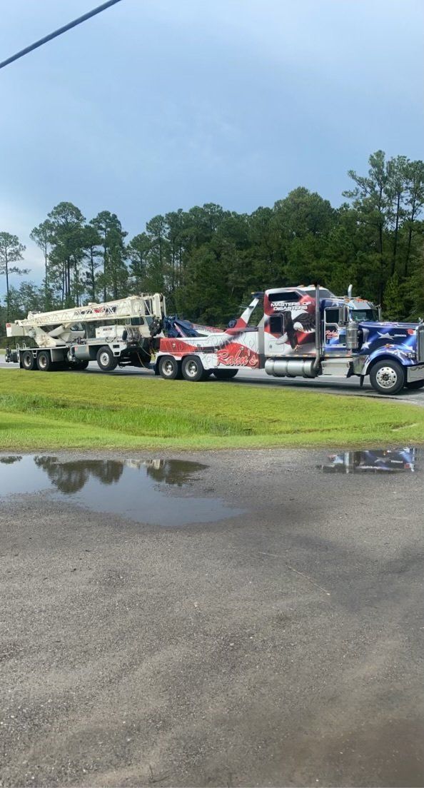 Towing A Huge Truck On Highway — Rincon, GA — Rahn’s Services