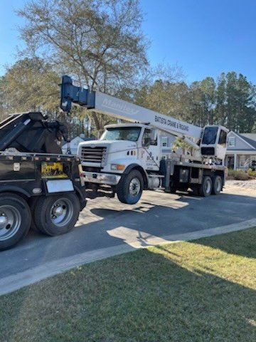 Towing Huge White Truck On A Highway — Rincon, GA — Rahn’s Services