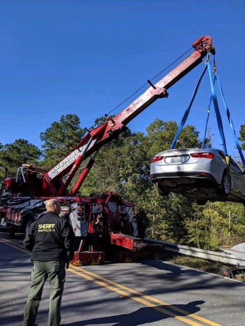Huge Tow Truck Lifting A Car — Rincon, GA — Rahn’s Services