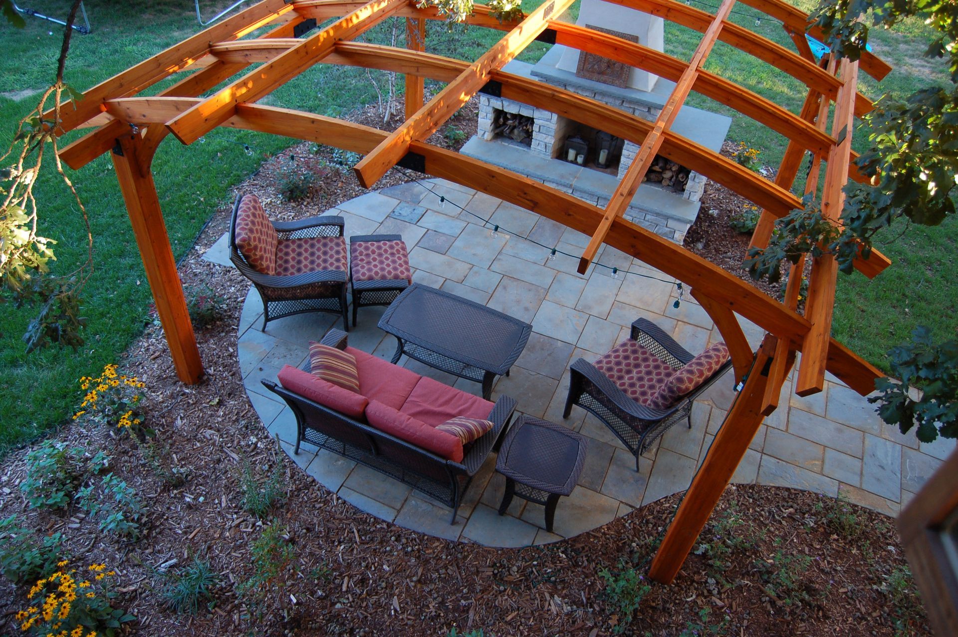 brick paver patio installation with outdoor furniture