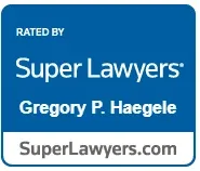Blue Super Lawyers badge: "Rated by Super Lawyers" featuring Gregory P. Haegele and SuperLawyers.com.