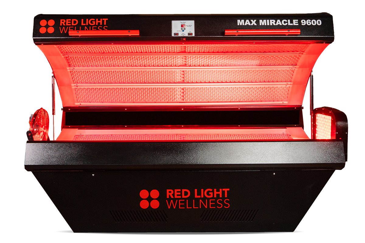 A red light wellness machine is sitting on a table
