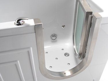 A walk in tub with a door that can be opened