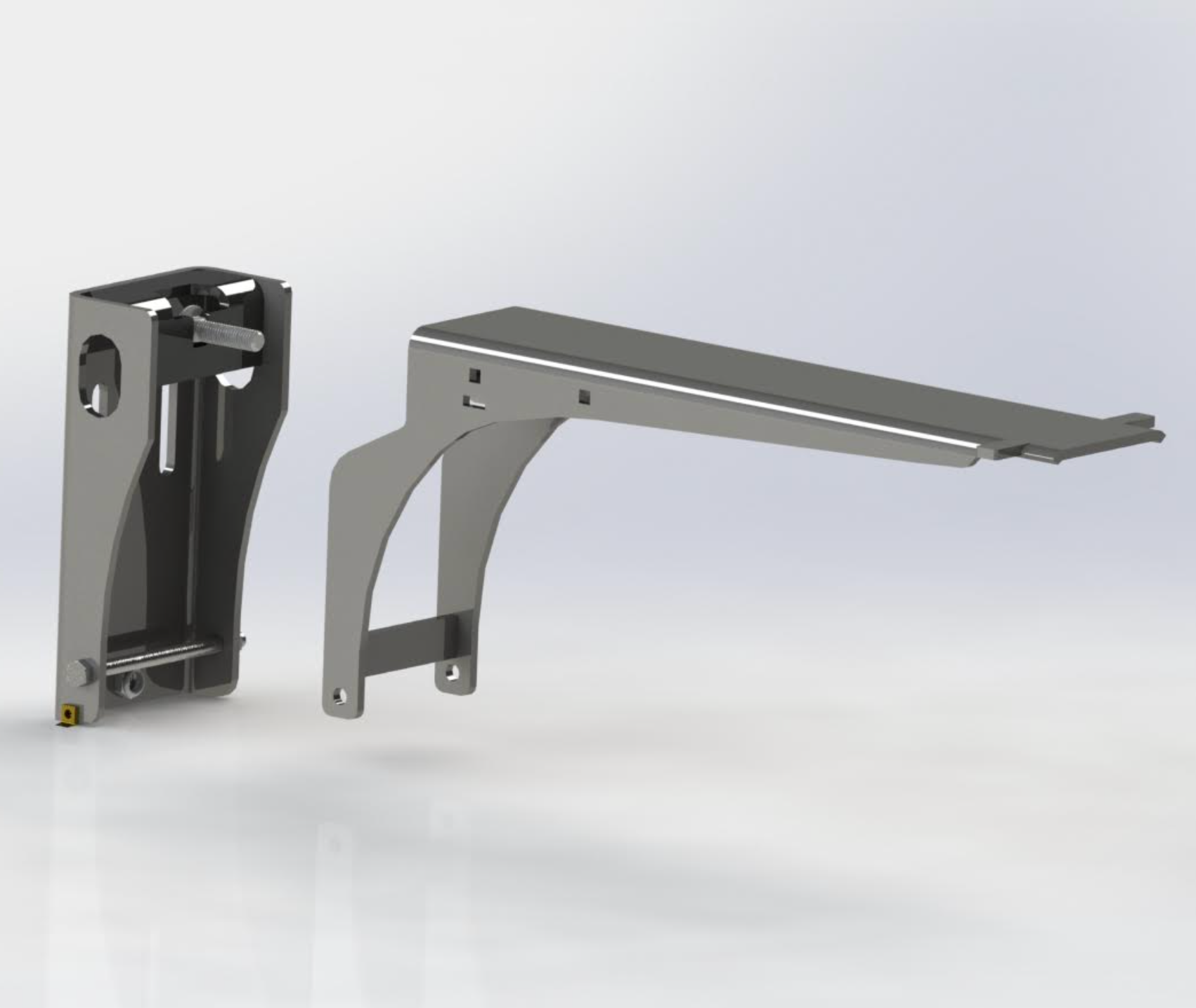 Two metal folding shelf brackets, grey, one folded and one extended.