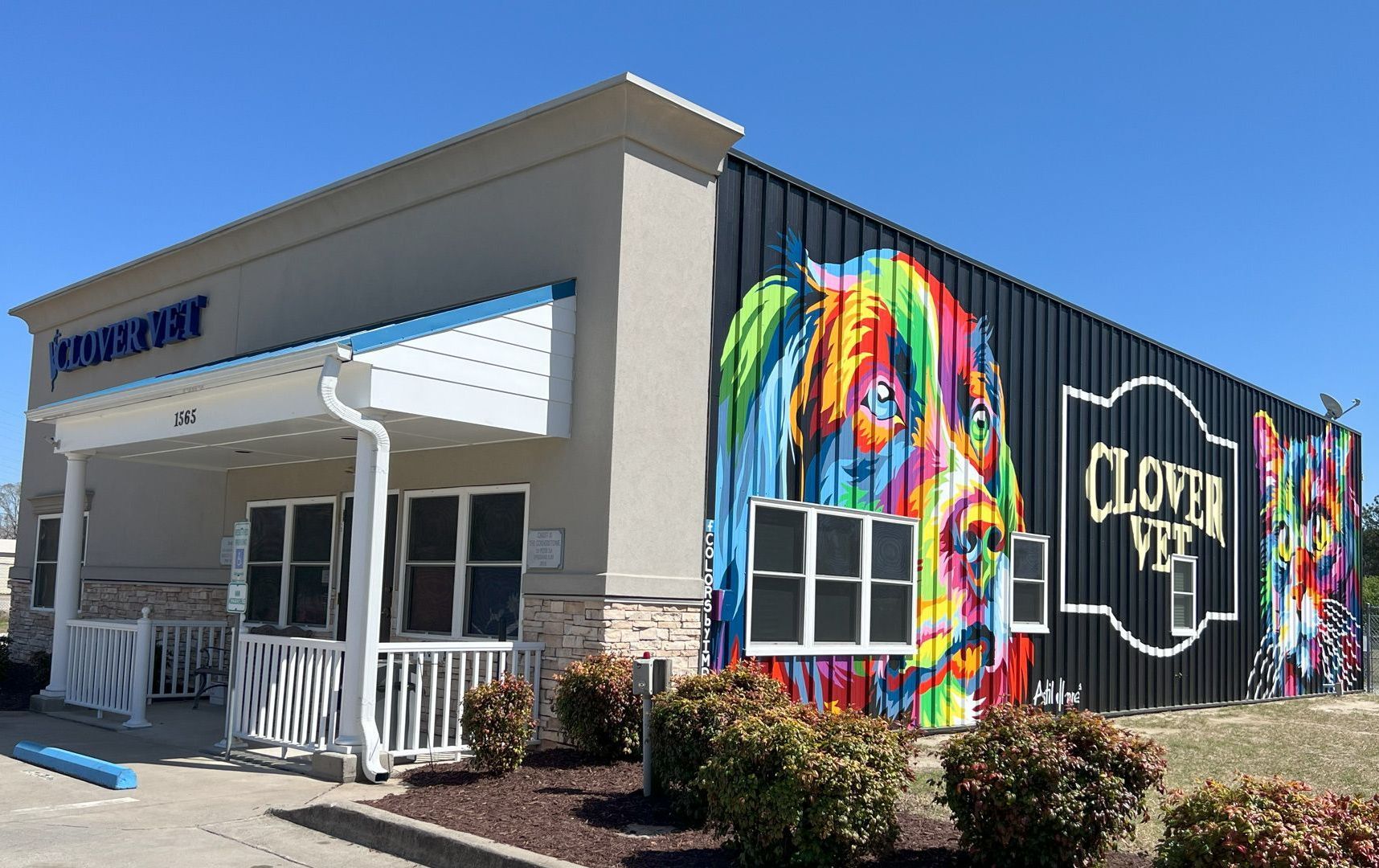 A building with a colorful mural on the side of it.