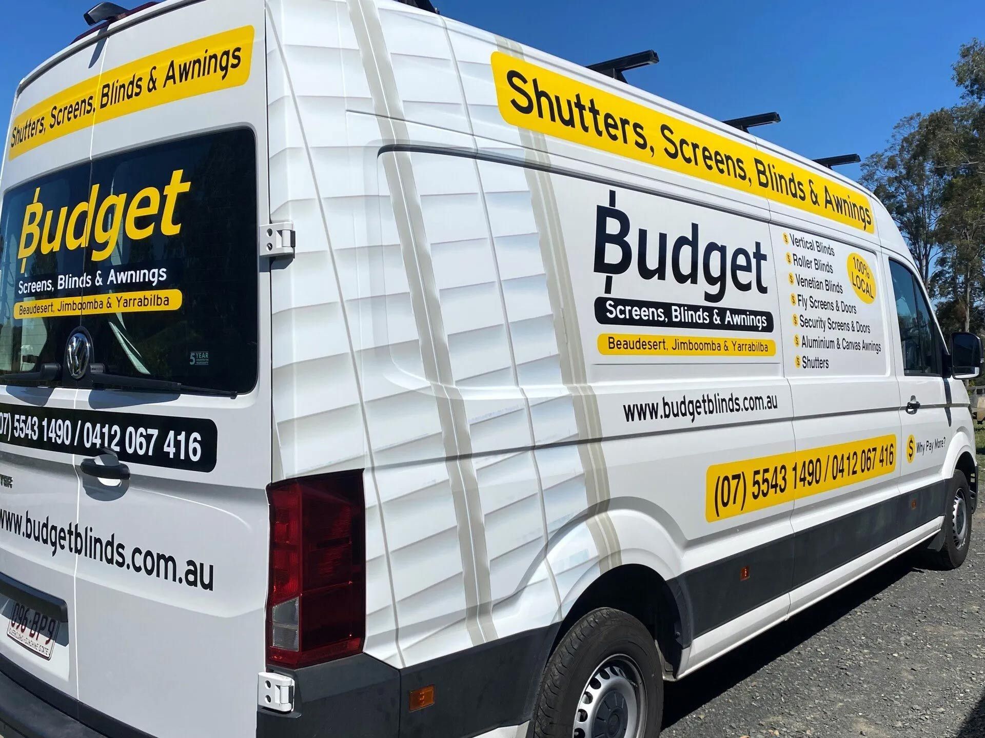 A white van with the word budget written on it
