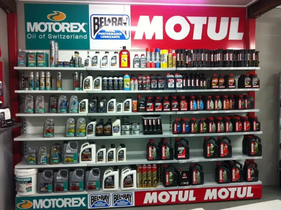 A store display of motul oil and motorex oil