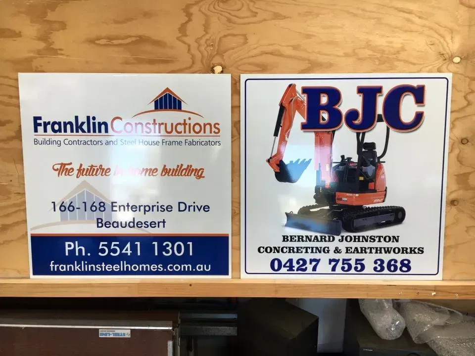 Two signs one for franklin constructions and the other for bjc