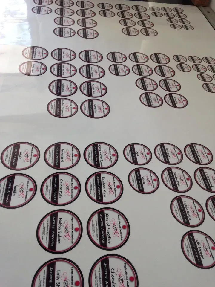 A bunch of stickers are laying on a table