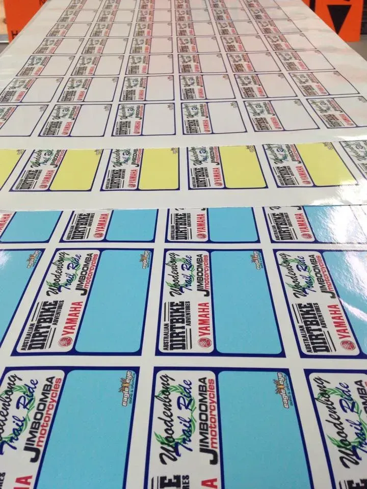 A bunch of stickers with one that says yamaha on it