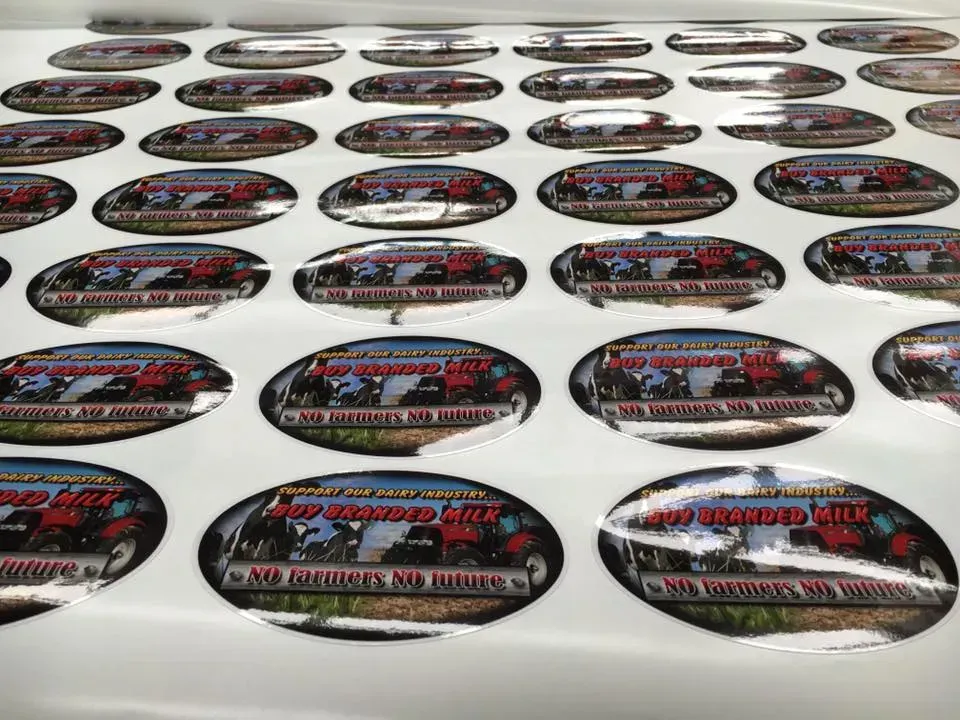 A bunch of stickers are sitting on top of each other on a table.