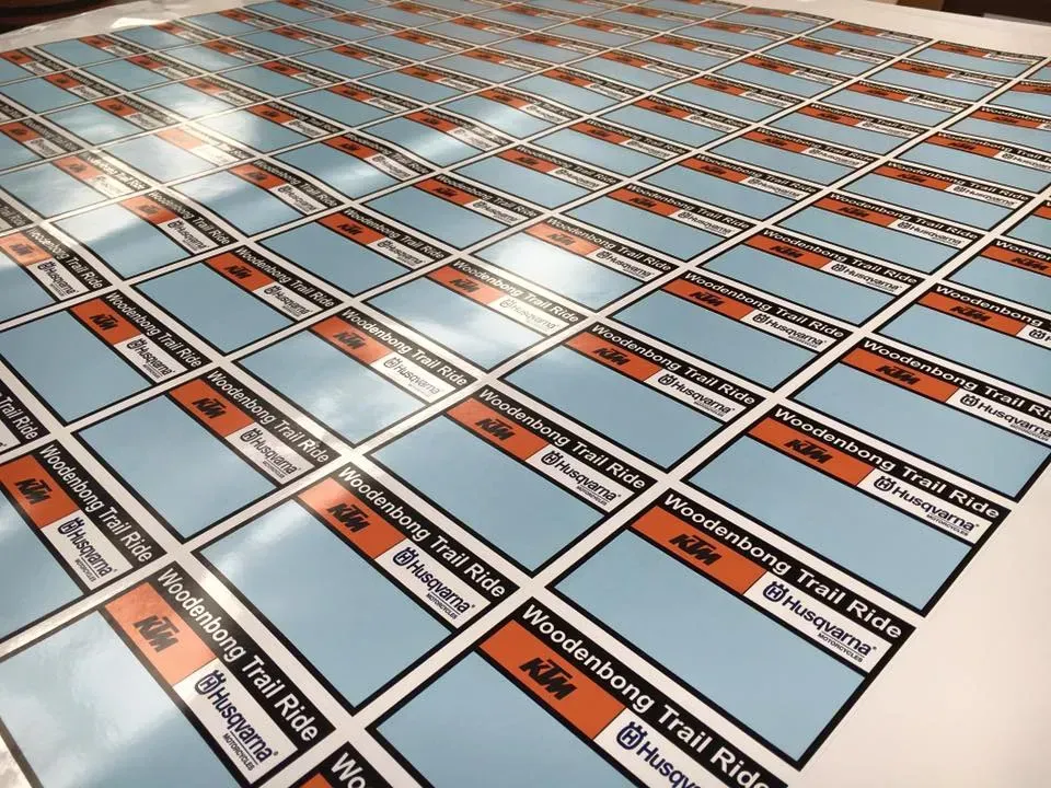 A bunch of stickers are laying on a table