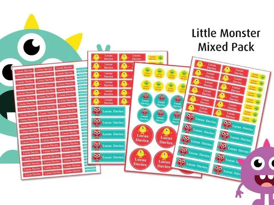 A mixed pack of little monster labels with a monster in the background.