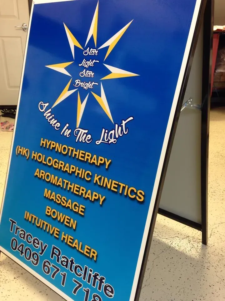 A sign that says shine in the light on it