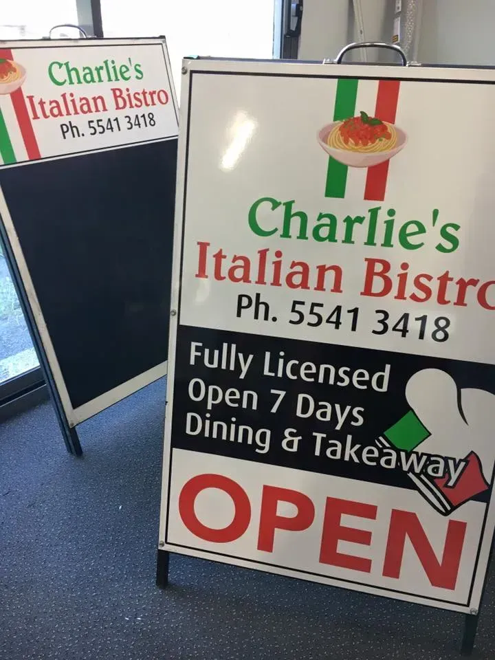 A sign that says charlie 's italian bistro on it