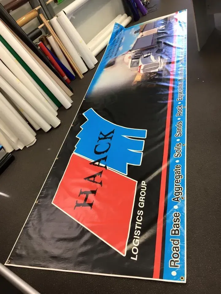 A haack logistics group banner is sitting on the floor