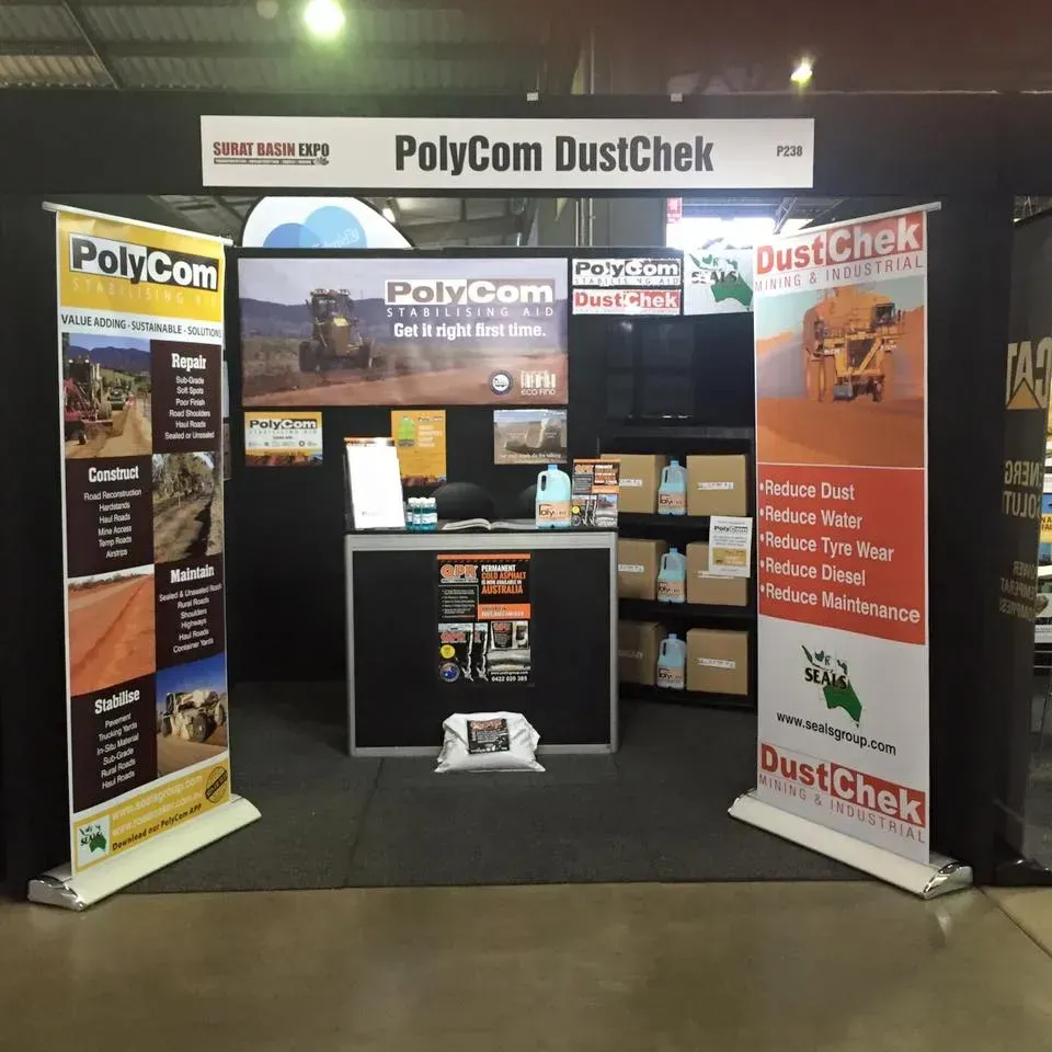 A booth for polycom dustchek is set up in a dark room