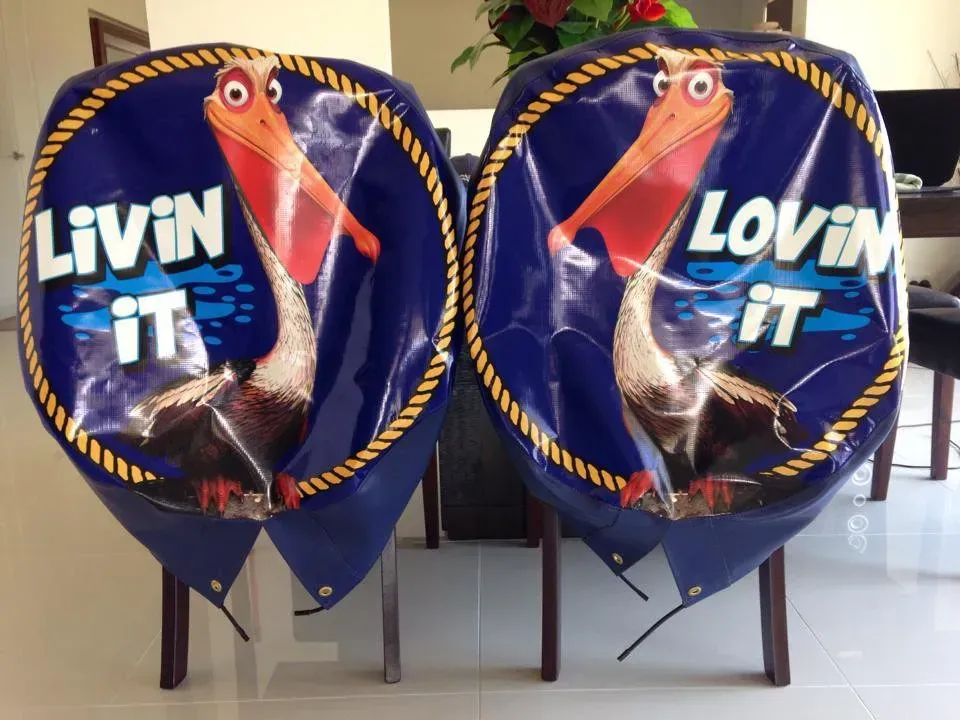 Two chair covers that say livin it and lovin it
