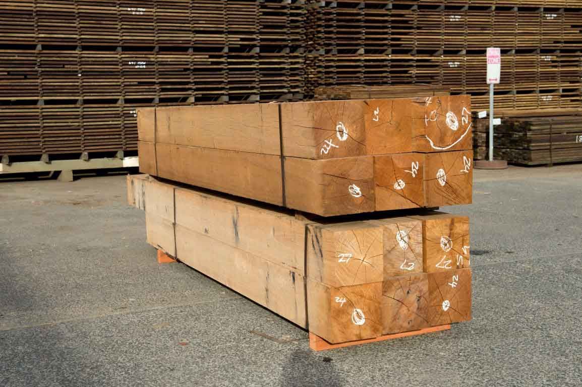 A Stack Of Wooden Blocks Sitting On Top Of Each Other On The Ground – Beaudesert, QLD - Enrights Sawmill