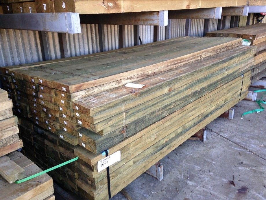 A Stack Of Wood Sitting On Top Of Each Other In A Warehouse – Beaudesert, QLD - Enrights Sawmill