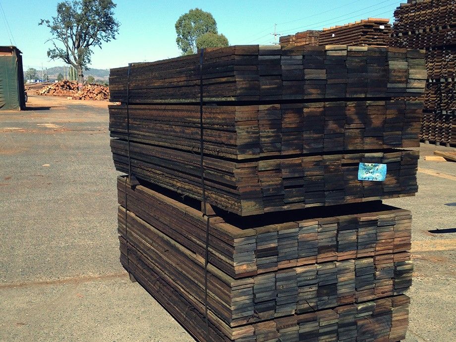 A Stack Of Wooden Boards With A Blue Tag – Beaudesert, QLD - Enrights Sawmill
