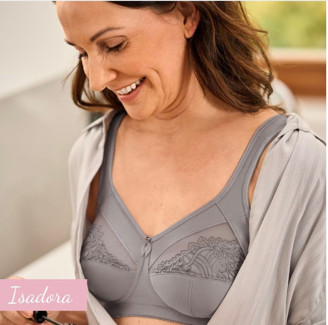 A Woman is Wearing a Black Slip With Lace Trim — Heart to Heart Lingerie in Port Macquarie, NSW